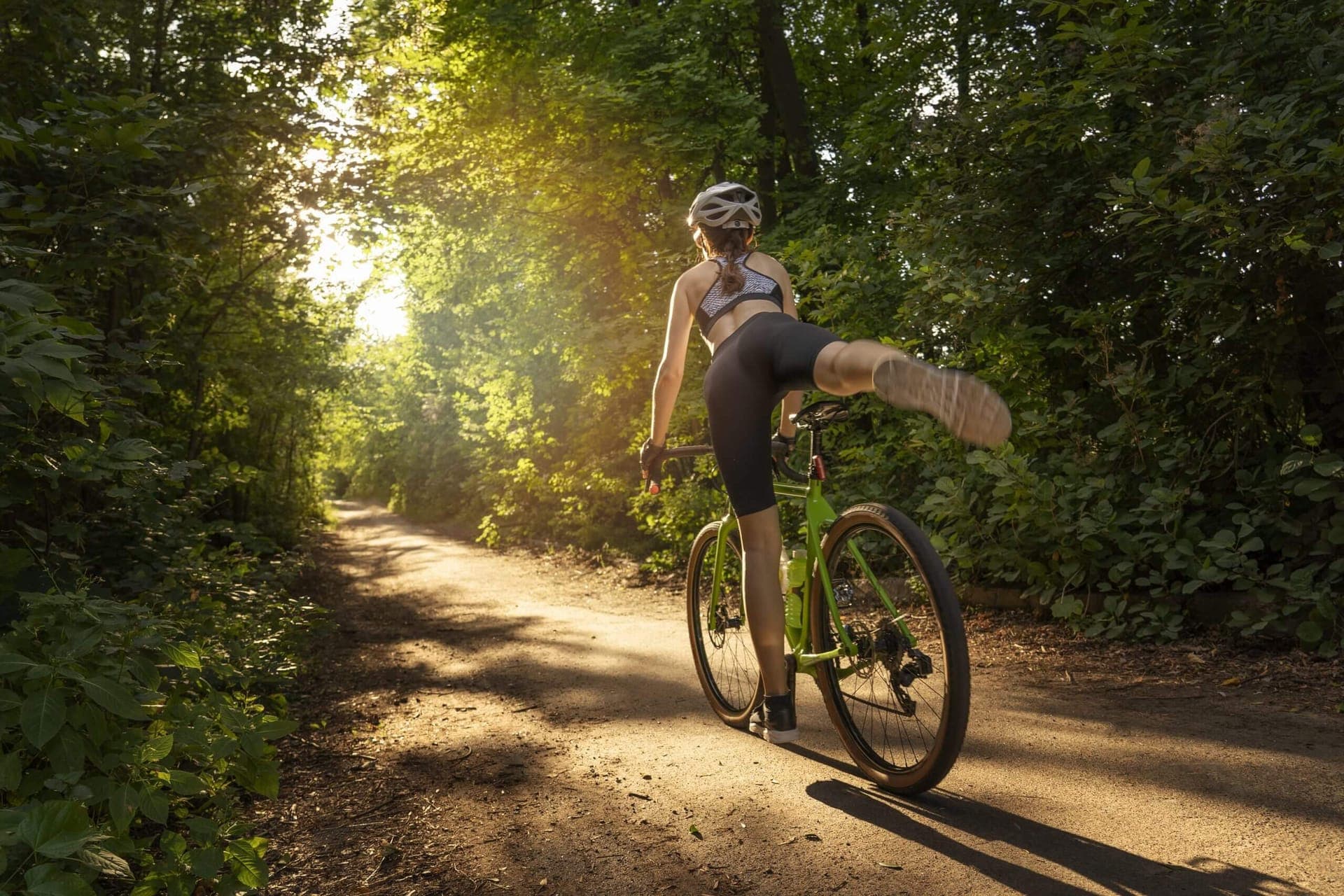 Female cyclist in the open air