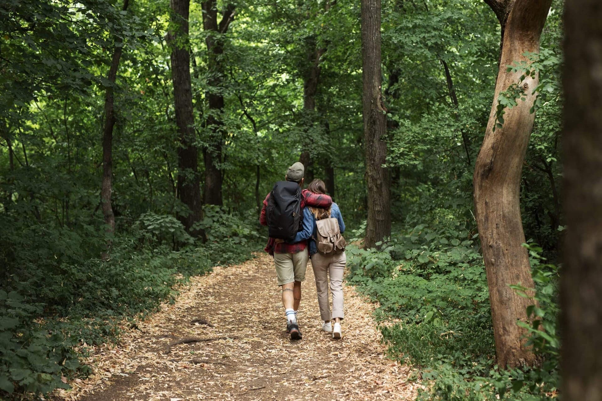 Happy couple enjoying a trip together in nature