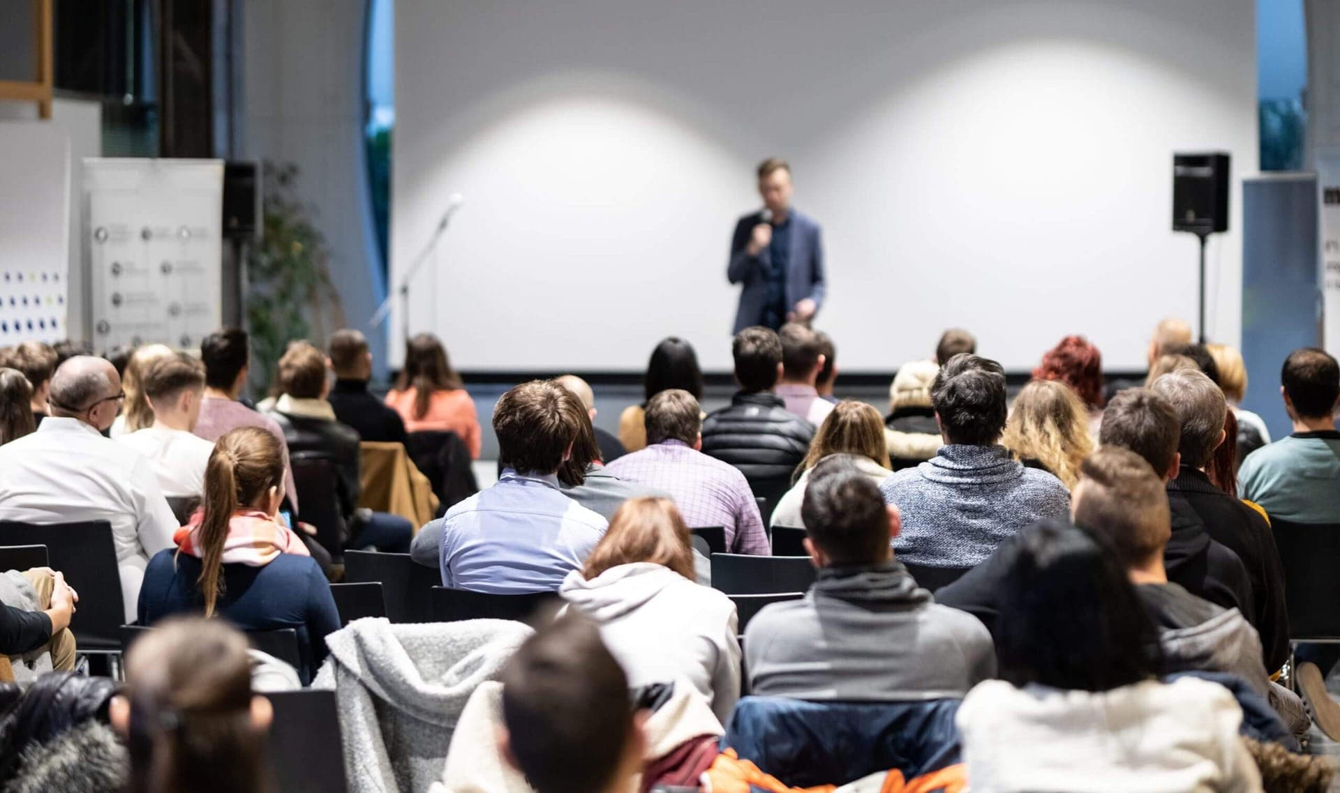 Conference hall with audience and speaker