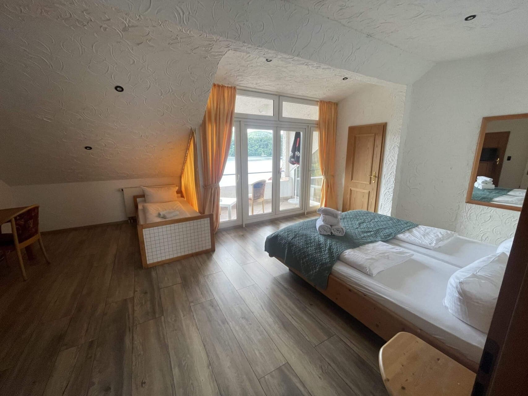 Junior suite with balcony overlooking Lake Edersee