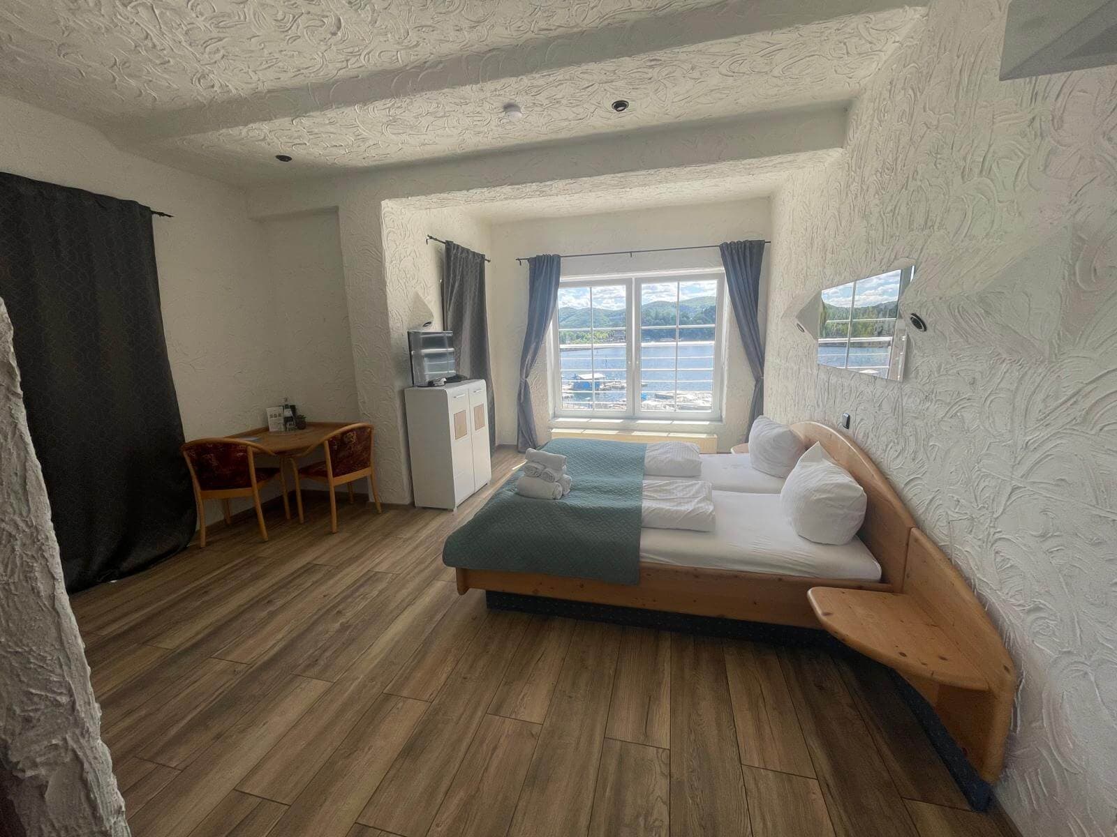 Superior room with balcony overlooking Lake Edersee